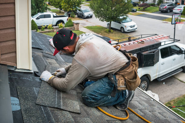 Professional Roofing technician working in Estes Park, CO